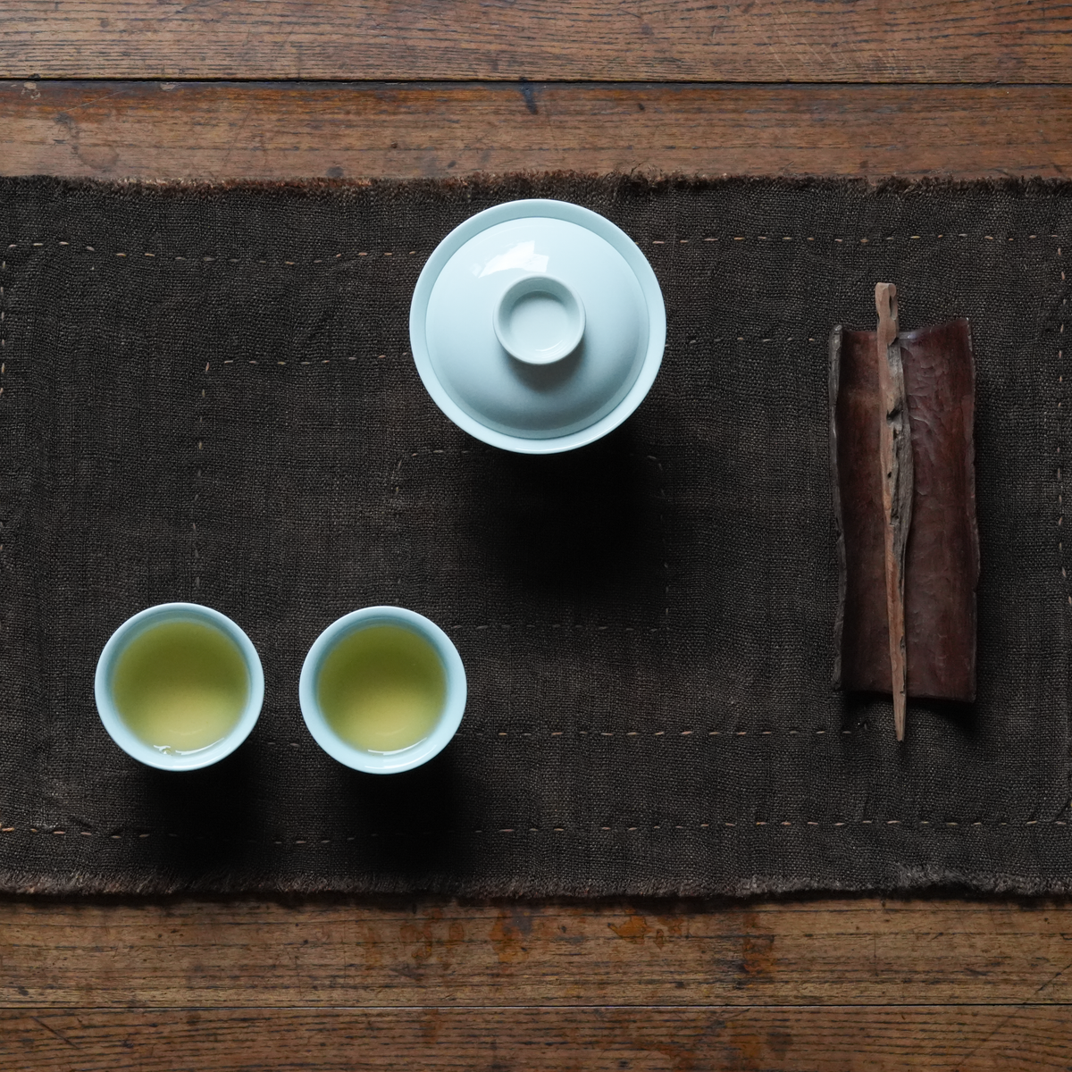 Hand-stitched Persimmon Dyed Tea Mat (Concentric Rectangle Stiching)