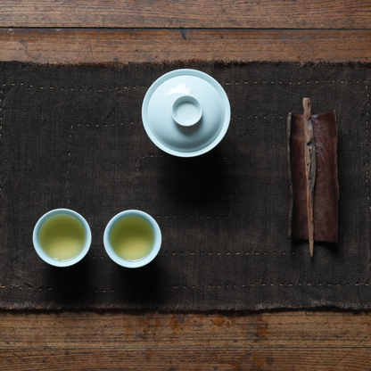 Hand-stitched Persimmon Dyed Tea Mat (Concentric Rectangle Stiching)