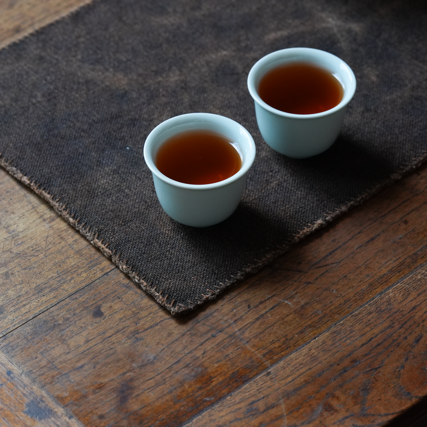 Hand-stitched Persimmon Dyed Tea Mat (Small)