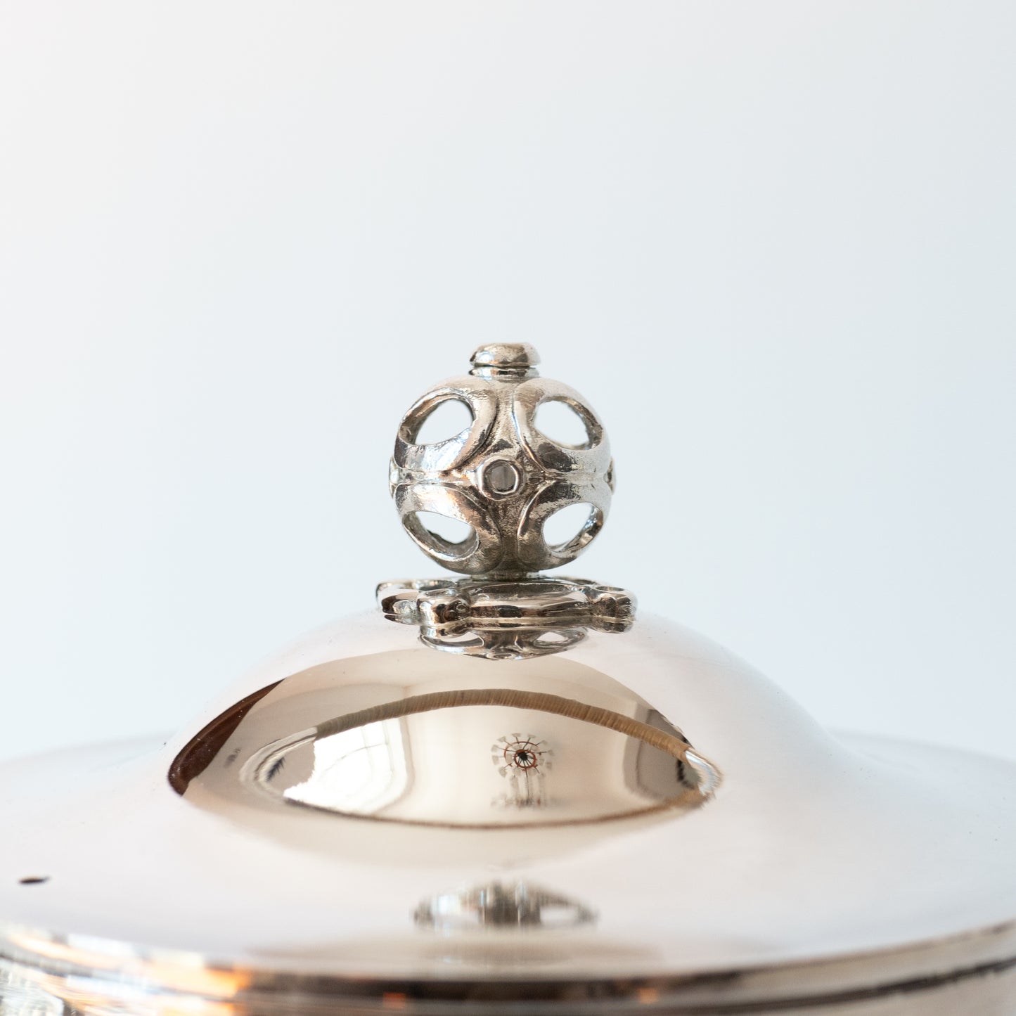 close up of silver kettle lid