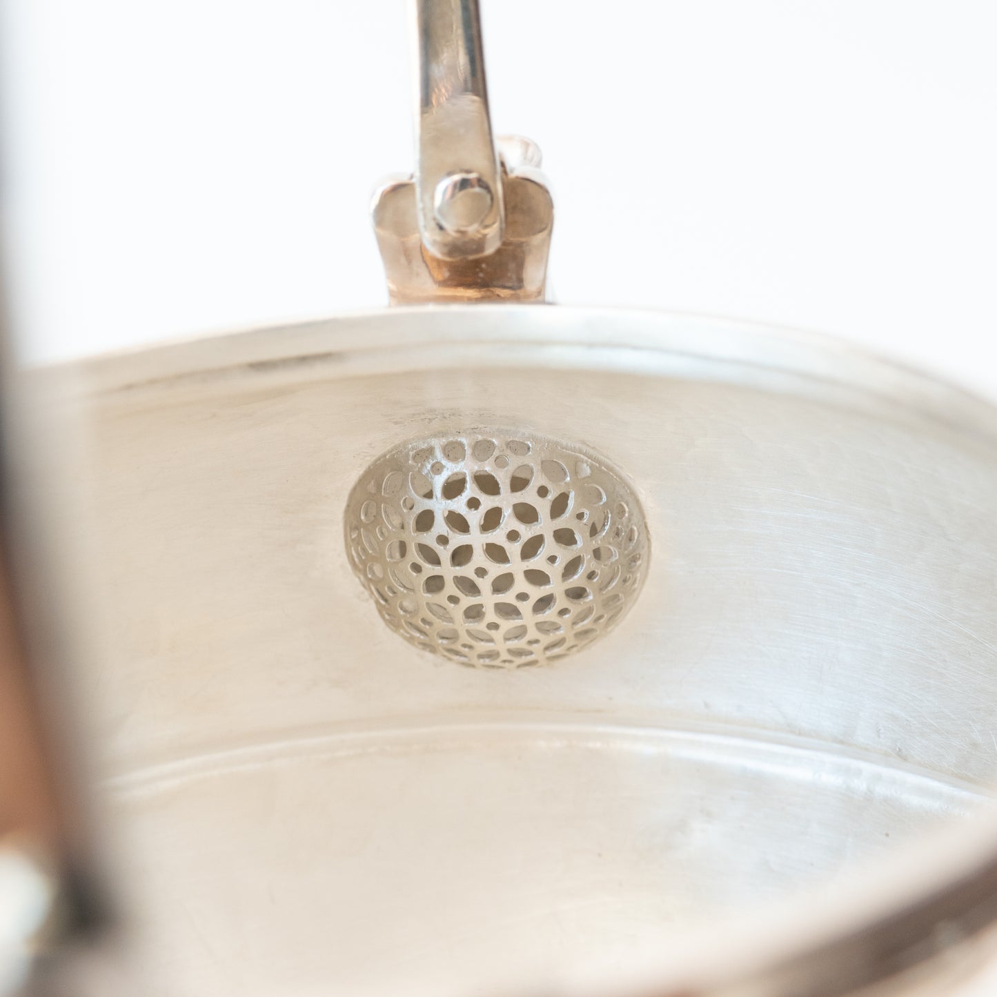 filter inside silver kettle/teapot